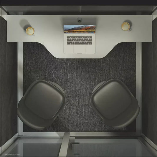 A spacious and well-equipped office pod from PrivacyPod.ai, set against the backdrop of a dynamic flexible workspace, symbolizing the future of efficient work environments.