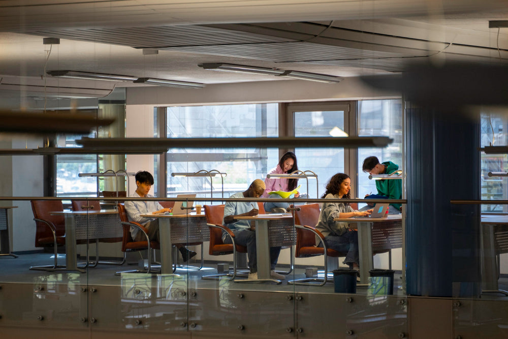 Diverse freelancers working in a modern coworking space 