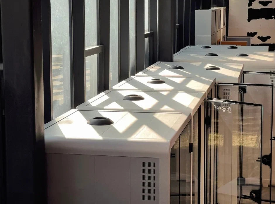 A creatively designed home office, blending style and functionality, with an office phone booth in the background, epitomizing the perfect remote work setup.