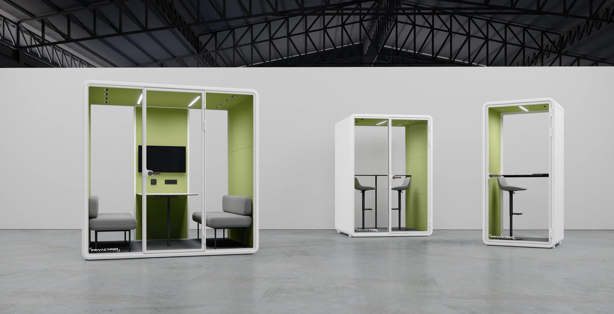 Three modern privacy pods with ergonomic seating and desk setups for deep work