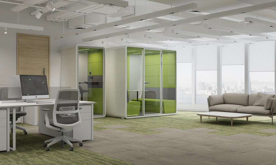 Office pods in open layout workspace