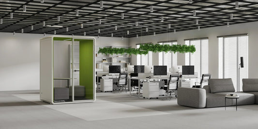 White and green office pod in open space layout