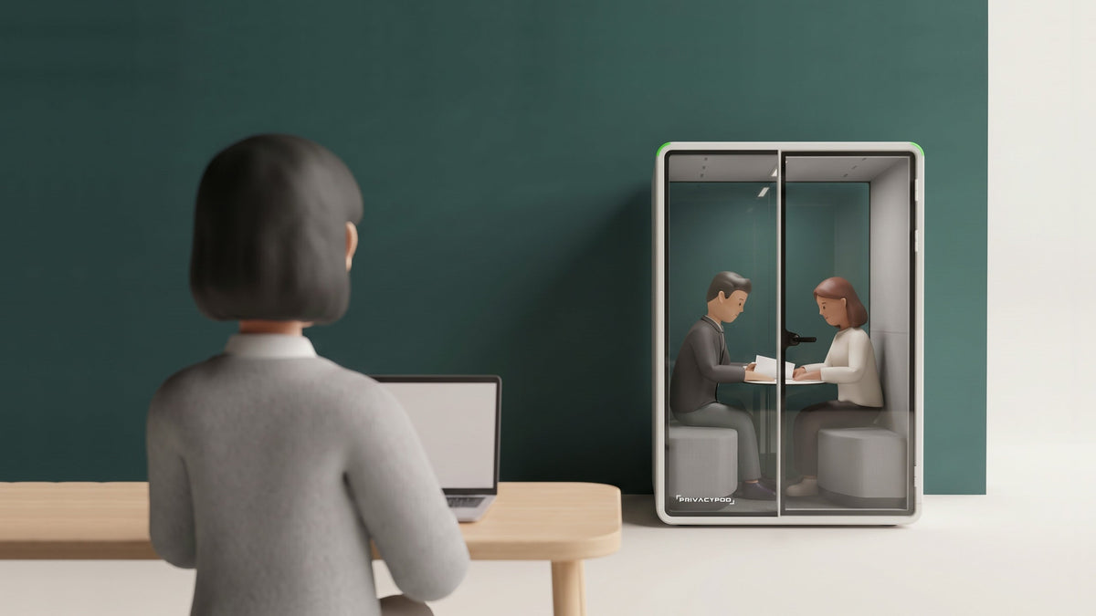 Illustration of an attorney and a client meeting inside a two-person glass pod, seen over the shoulder of a colleague working at her desk nearby.