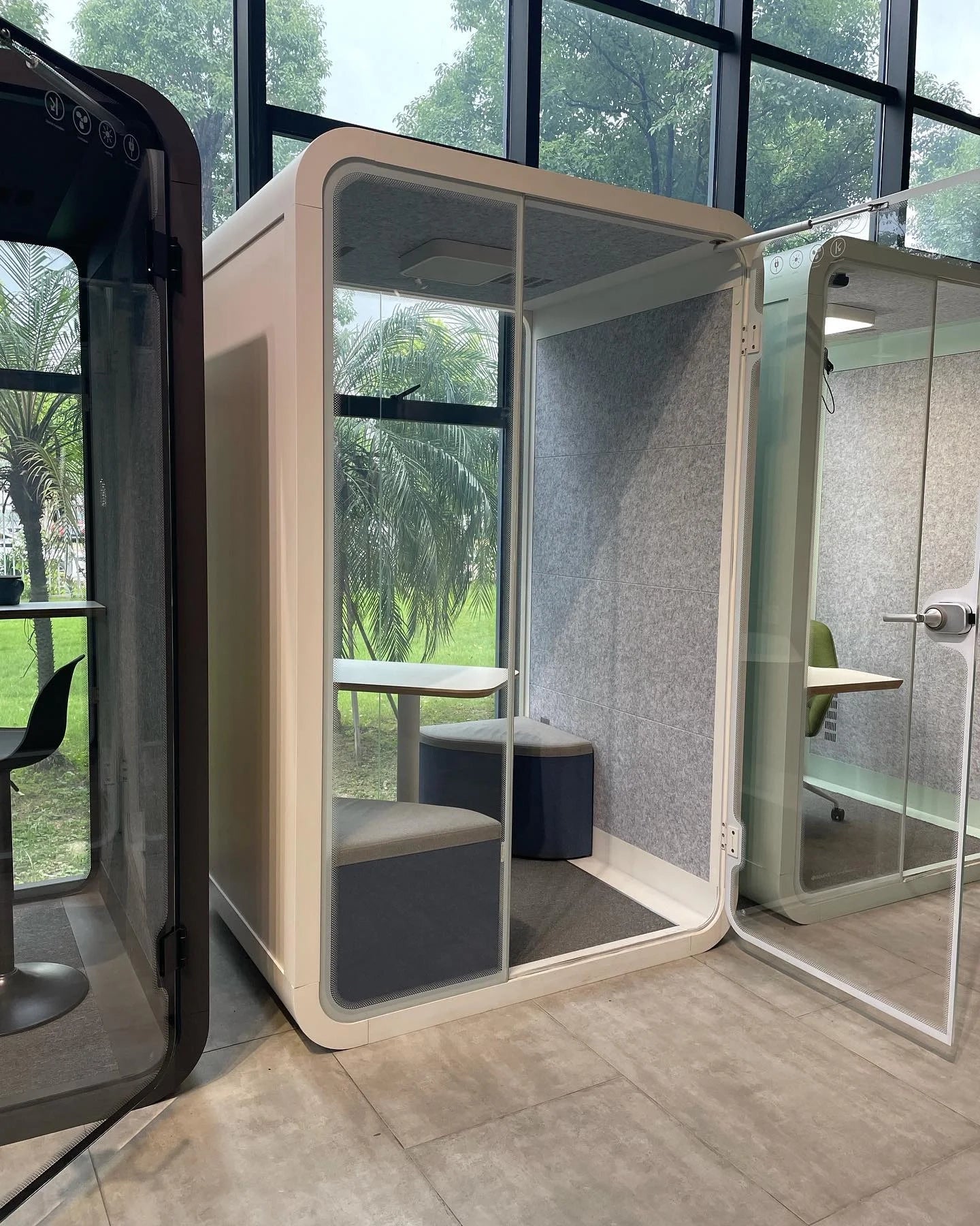 Compact PrivacyPod designed for two people, ideal for use as a soundproof phone booth, modular room, or privacy booth. This pod enhances office rooms by providing a quiet, private space for focused work, meetings, and personal focus