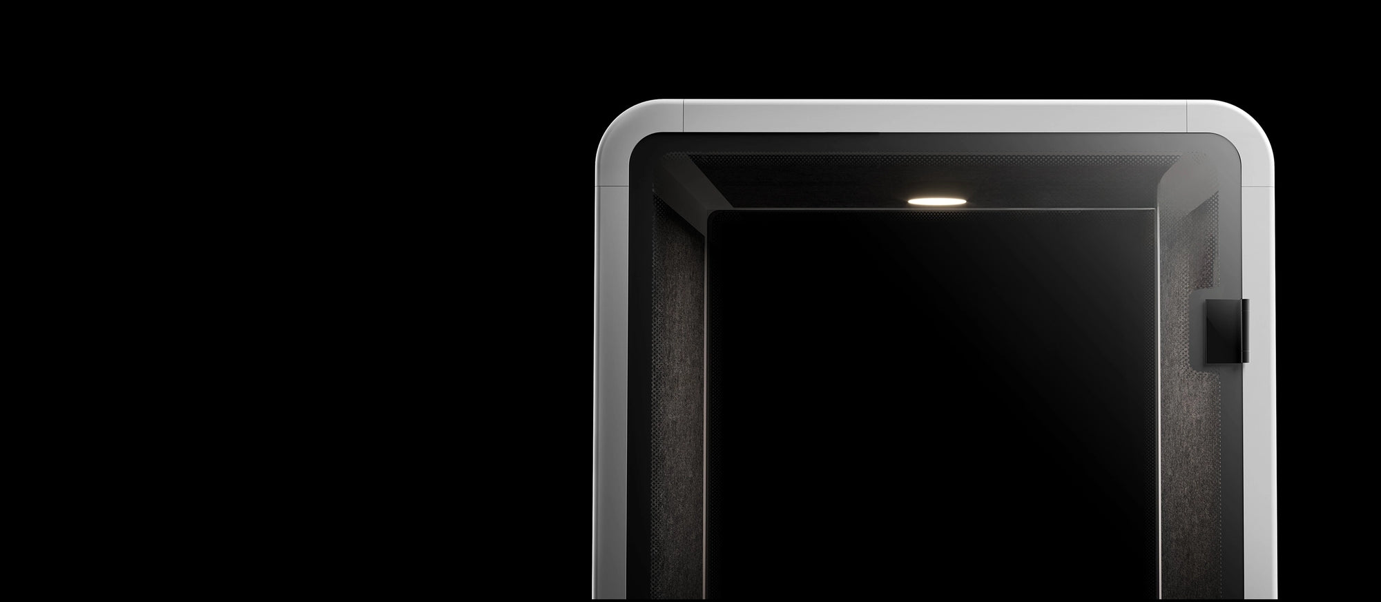 Modern soundproof office booth with interior lighting against black background.