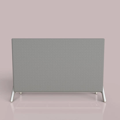 Gray fabric room divider with modern white legs against a pink background.
