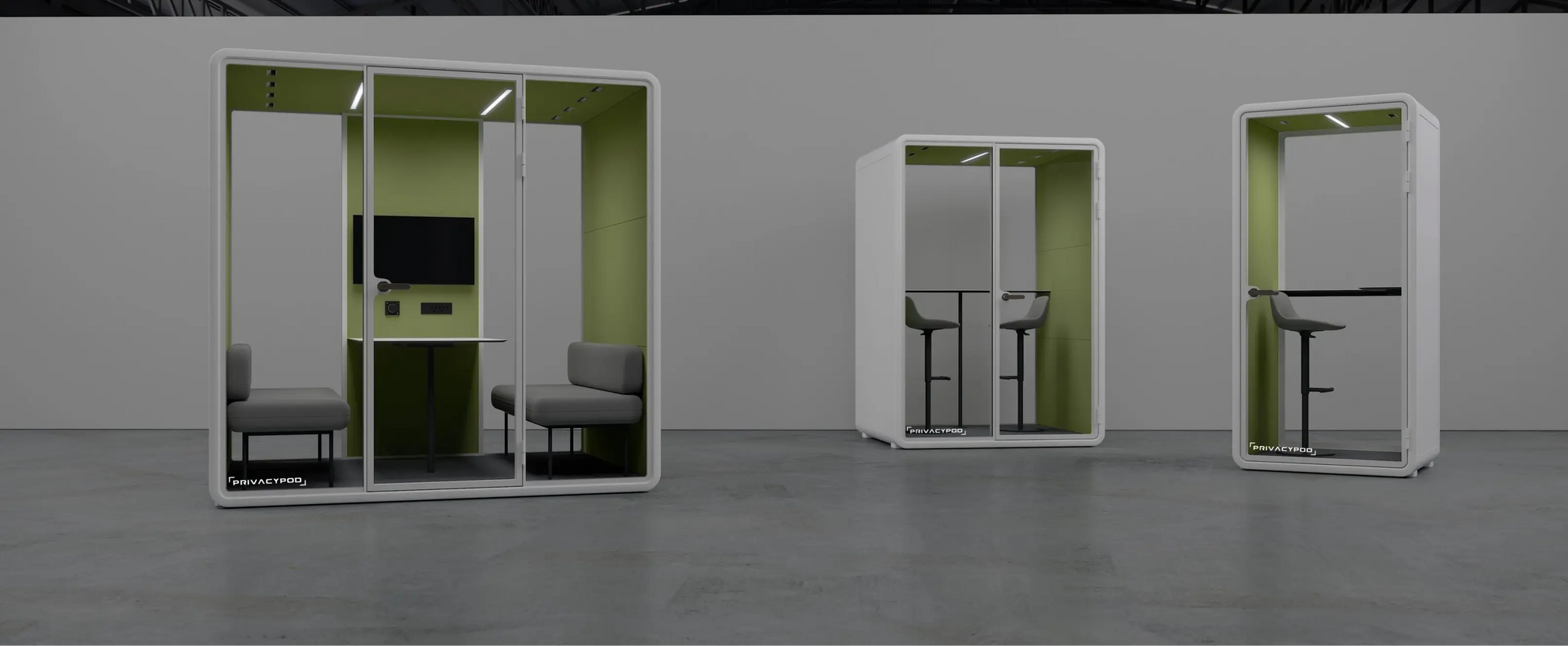 Modern office privacy pods with seating and workstations, featuring glass doors and green interiors, set in a gray room.