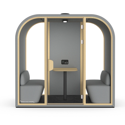 PrivacyPod Arc L Pod with two benches, mounted meeting table, and partial solid back wall