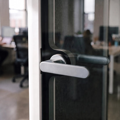 PrivacyPod S Pod brushed metal door handle on the glass door