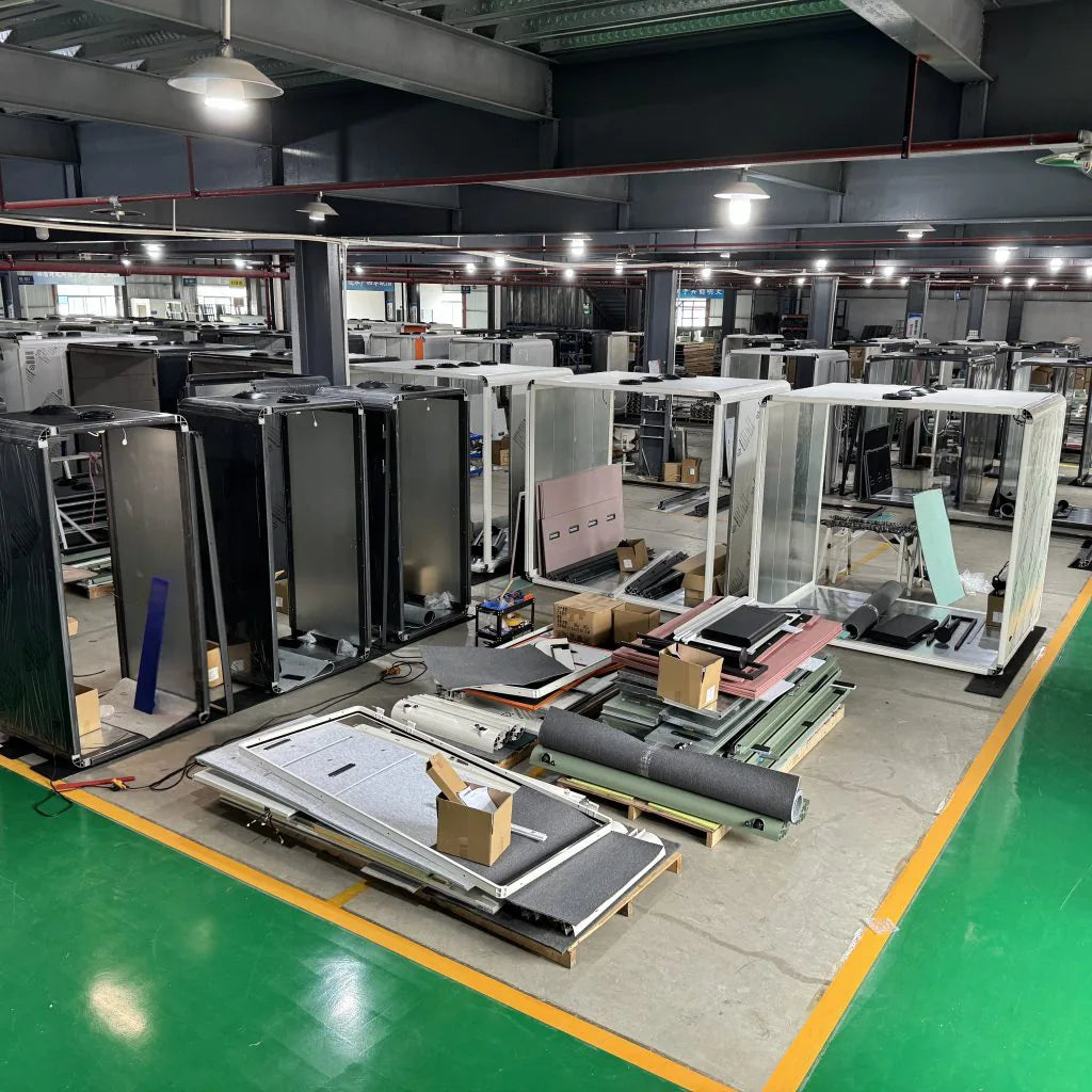 Office pod frames and panels being assembled on the factory floor